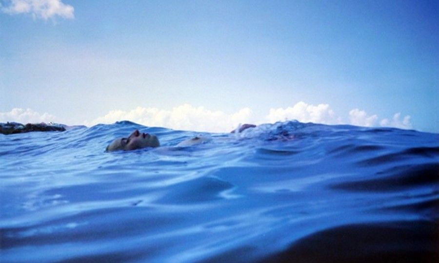 Christine Floating in the Sea, St Barth’s, 1999Photography by Nan Goldin I